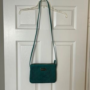 Teal and black BCBGeneration purse.